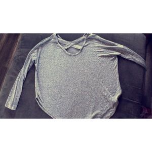 2x gray long sleeve. Stretchy material can fit 3x